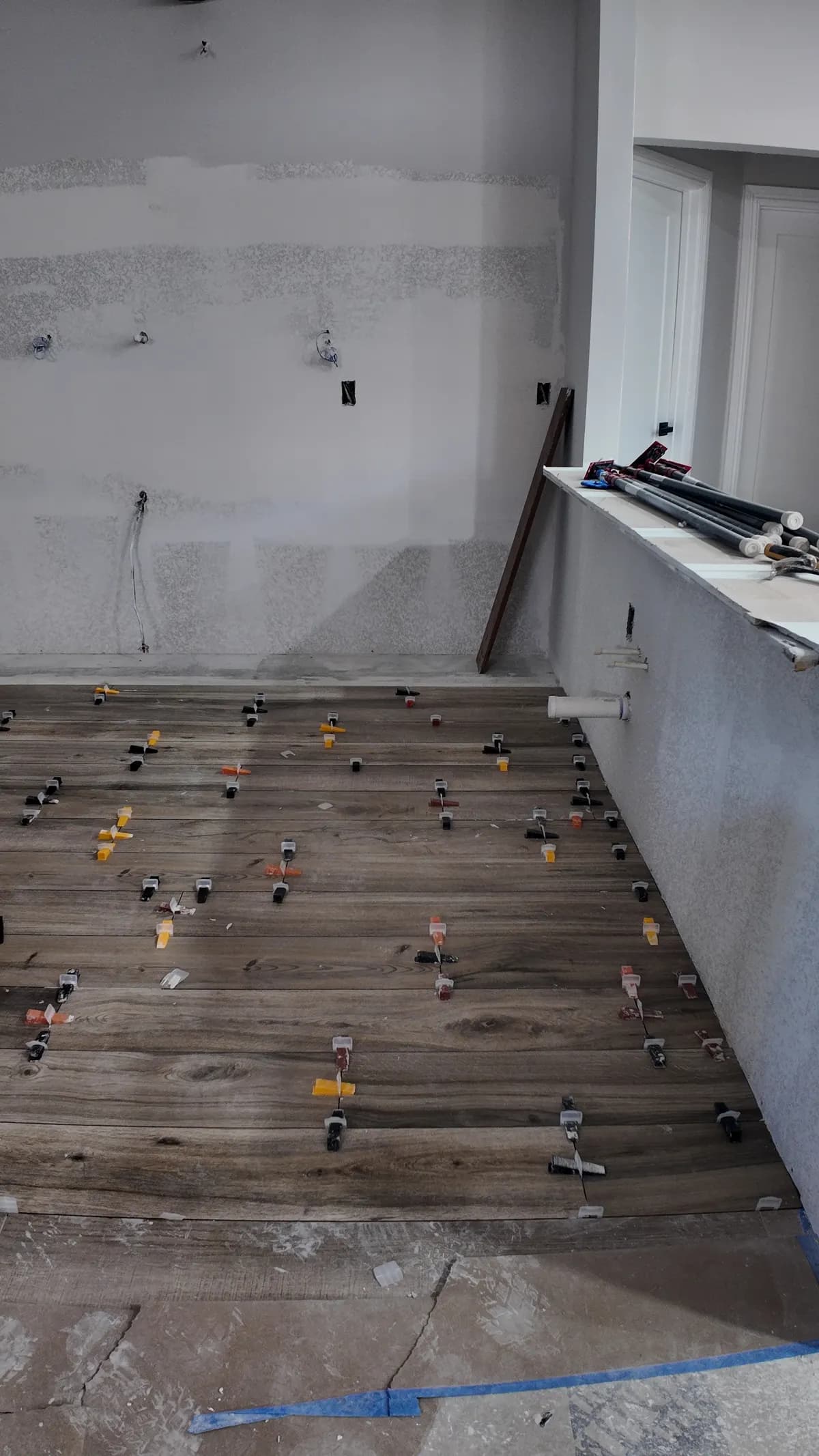 Interior drywall and flooring repair in progress