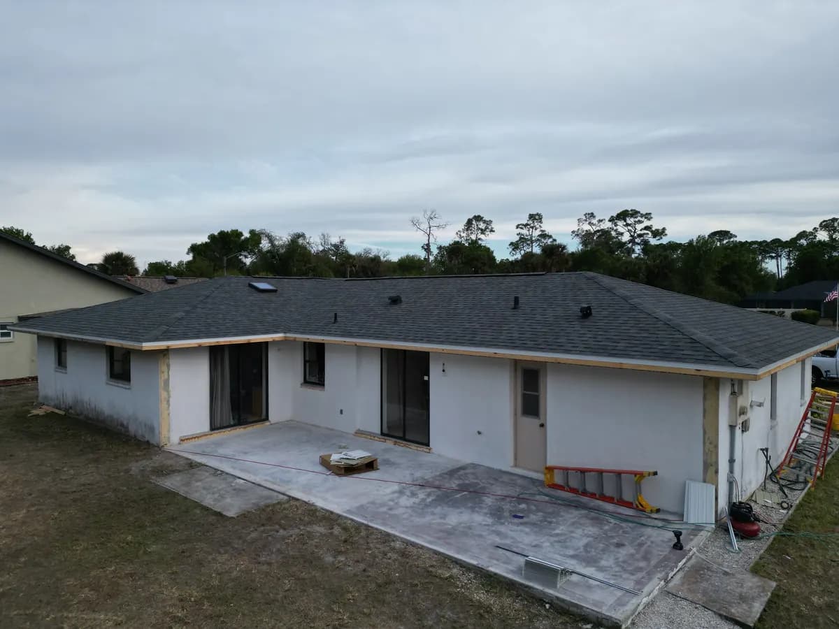Completed new shingle roof, aerial drone view